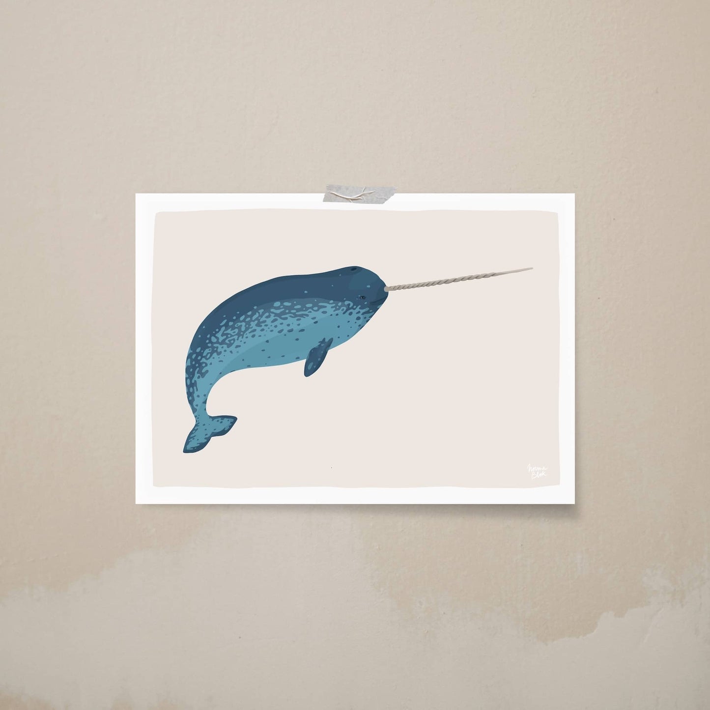 A framed narwhal print attached to a beige wall with clear tape, creating a casual and minimalist aesthetic that focuses on the print's soft tones.