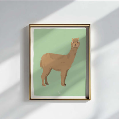 A stunning alpaca art print displayed in a luxurious gold frame. The metallic finish adds a touch of sophistication to the cozy illustration, demonstrating how wildlife art can elevate the decor of a refined and modern living room.