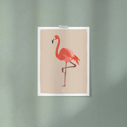 Flamingo print attached to a green wall using clear tape. A simple and direct decor option.