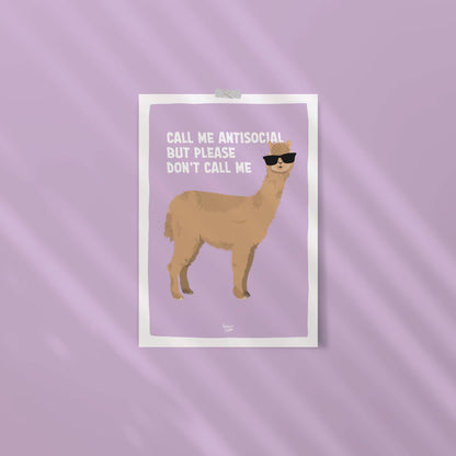 An ISO-proportion alpaca print stuck to a vibrant violet wall with washi tape by Normablok.