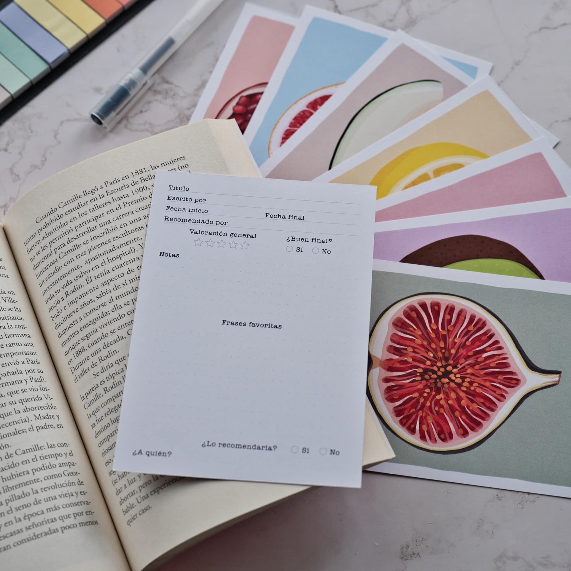 Close up of the back of a fruit reading log card showing a clean template to fill in book titles, ratings, and favorite quotes by Normablok.