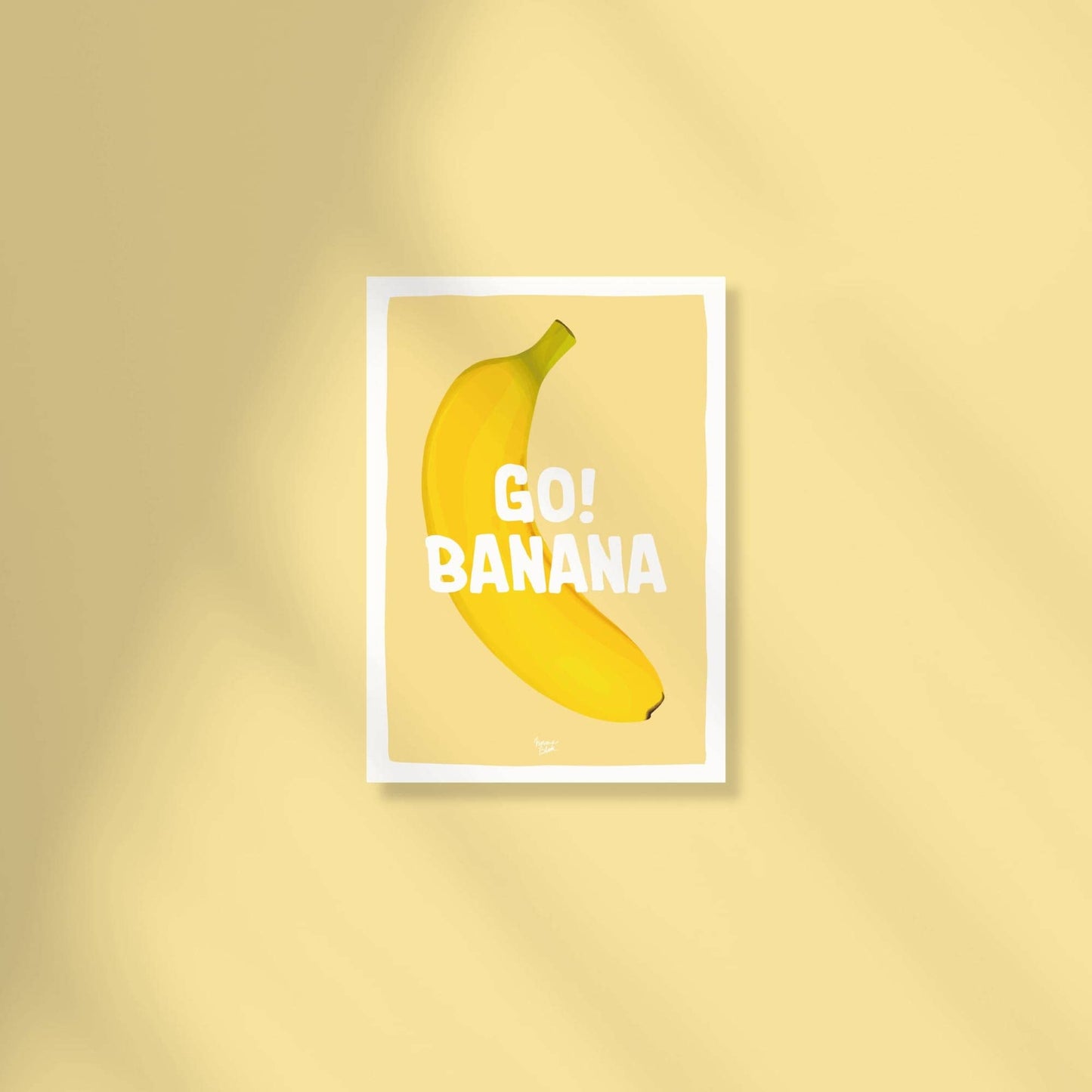 A vibrant A6 postcard featuring a detailed digital illustration of a banana with the funny text "Go Banana" in a modern, playful font against a colorful background by Normablok.