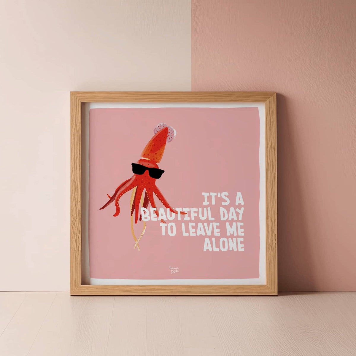 A square ratio version of the sassy squid poster casually leaning against a modern wall by Normablok.