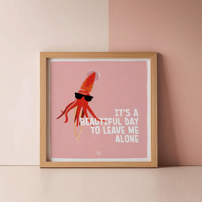 A square ratio version of the sassy squid poster casually leaning against a modern wall by Normablok.