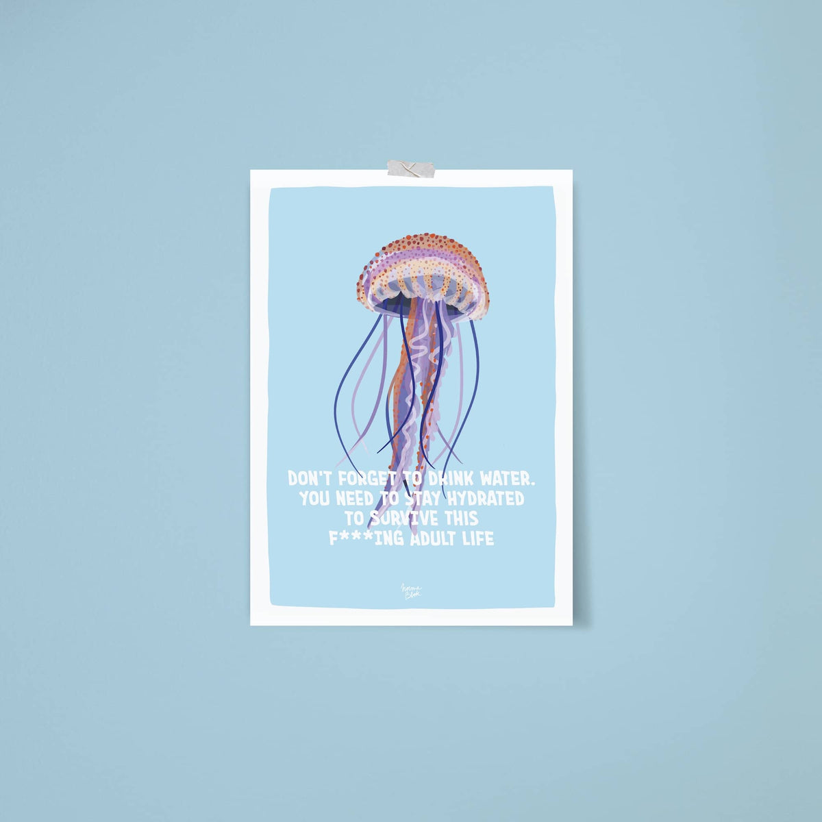 An ISO-proportion print stuck to a vibrant blue wall with washi tape, giving it an easygoing, artistic vibe.