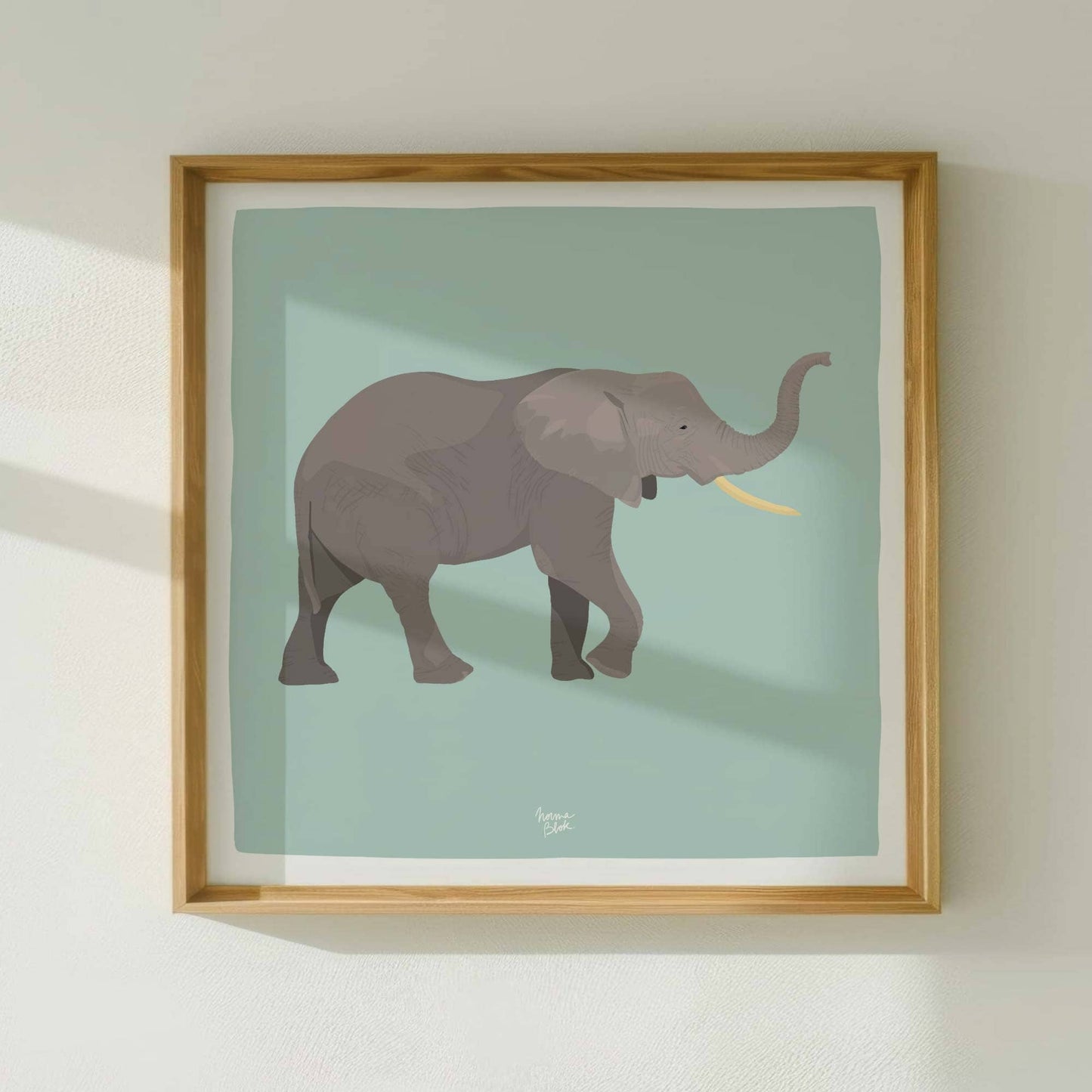 The figurative African elephant digital illustration adapted into a balanced square format layout. The artwork is beautifully framed in natural wood, showcasing the centered design inside the signature white perimeter border for a clean, modern display.
